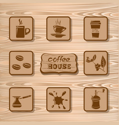 Set Coffee Icons On A Wooden Background