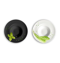 Empty Black And White Plates With Greens