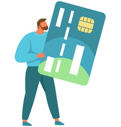 Businessman Standing And Holding Credit Card