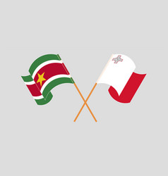 Crossed And Waving Flags Of Suriname And Malta