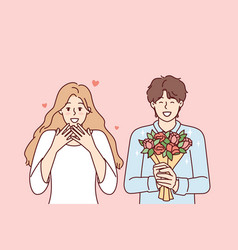 Romantic Man Holding Flowers And Happy Woman