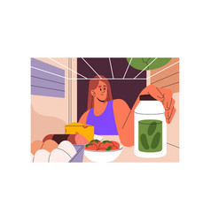 Young Woman Looking In Full Fridge Inside View