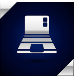 Silver Laptop Icon Isolated On Dark Blue