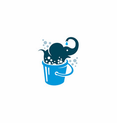 An Elephant Bathing In A Bucket