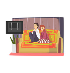 Bored Couple Sitting On Cozy Couch Watching Tv