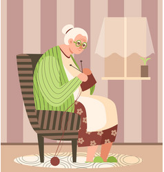 Old Lady Sitting In Armchair And Knitting Elderly