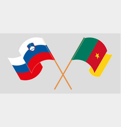 Crossed And Waving Flags Of Cameroon And Slovenia