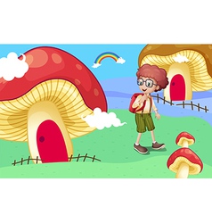 A Boy Near The Giant Mushroom Houses