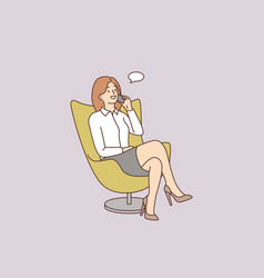 Smiling Businesswoman In Chair Talking On Cell