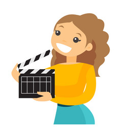 Smiling Woman Holding An Open Clapperboard