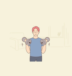 Young Man With Barbells Train At Home