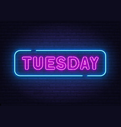 Tuesday Neon Sign On Brick Wall Background