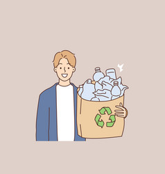 Smiling Man Hold Plastic For Recycling