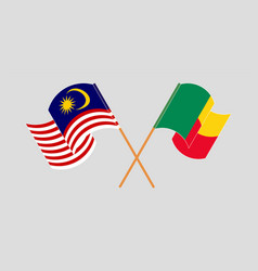 Crossed And Waving Flags Of Malaysia And Benin