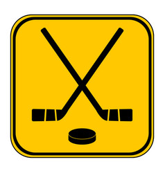 Two Crossed Hockey Sticks And Puck Icon