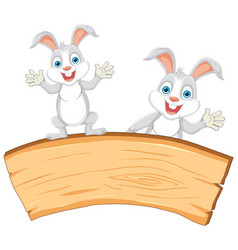 Two Cartoon Rabbits Cheerfully Presenting A Blank