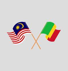 Crossed And Waving Flags Of Malaysia And Mali