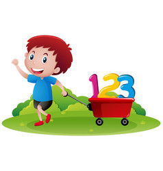 Little Boy Pulling Wagon With Numbers