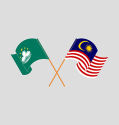 Crossed And Waving Flags Of Macau And Malaysia