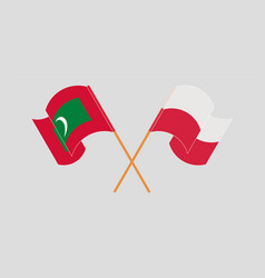 Crossed And Waving Flags Of Maldives And Poland