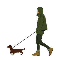 Urban Boy Walking Dachshund Dog On The Leash