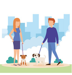 Young Couple With Dogs In The Park