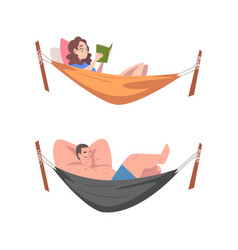 Male And Female Lying In Hammock Reading Book