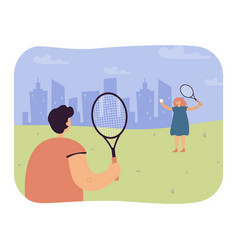 Children Playing Tennis Outside