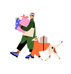 Woman And Dog Walking With Christmas Gifts