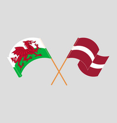 Crossed And Waving Flags Of Wales And Latvia