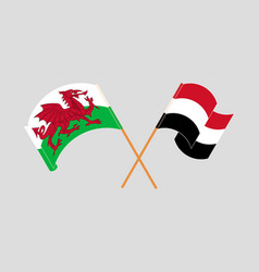 Crossed And Waving Flags Of Wales And Yemen