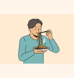 Asian Man Eats Ramen With Chinese Sticks Enjoying