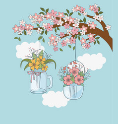 Mason Jars With Flower Hanging In Tree Branch