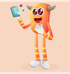 Cute Orange Monster Holding Mobile Phone