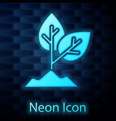 Glowing Neon Plant Icon Isolated On Brick Wall