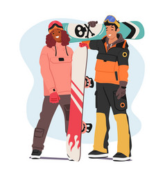 Two Snowboarders Strike Dynamic Poses