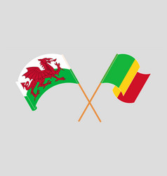 Crossed And Waving Flags Of Wales And Mali