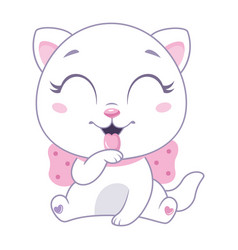 Little White Cat With Pink Bow Washes Licking Paw