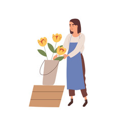 Woman Florist In Apron Care Yellow Flowers