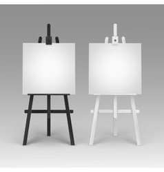 Set Of Wooden Black White Easels With Canvases