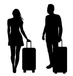 Silhouettes Of A Woman And Man With Suitcases