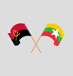 Crossed And Waving Flags Of Angola And Myanmar