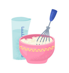 Pink Bowl With Whisking Mixture Next To Measuring