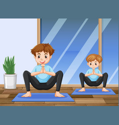 Dad And Son Doing Yoga At Home