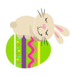 Cute Bunny Sleeping On Top Of A Big Easter Egg