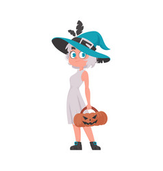 A Girl Is Dressed As Witch And Holding