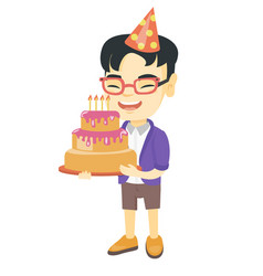 Asian Child Holding Birthday Cake With Candles