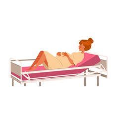 Young Pregnant Woman Lying On Hospital Bed Having