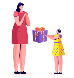 Daughter Giving Mother Present On Birthday