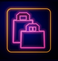 Glowing Neon Paper Shopping Bag Icon Isolated On